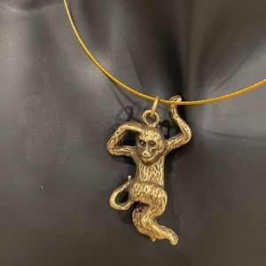 Brass monkey on a choker